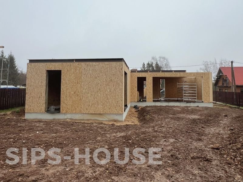 assembly of structural SIPS kit for 119 m² L-shaped house sips-house.com OARNGE