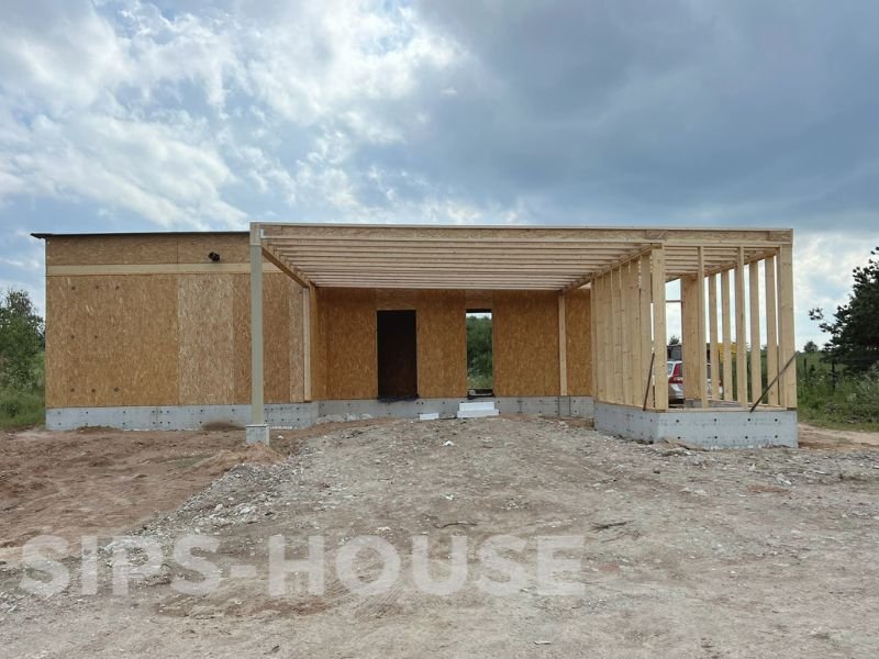 Completed structural SIPS house kit ORANGE carport sips-house.com