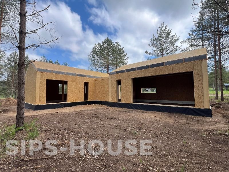 L-shaped 107 m² prefab SIPS house kit