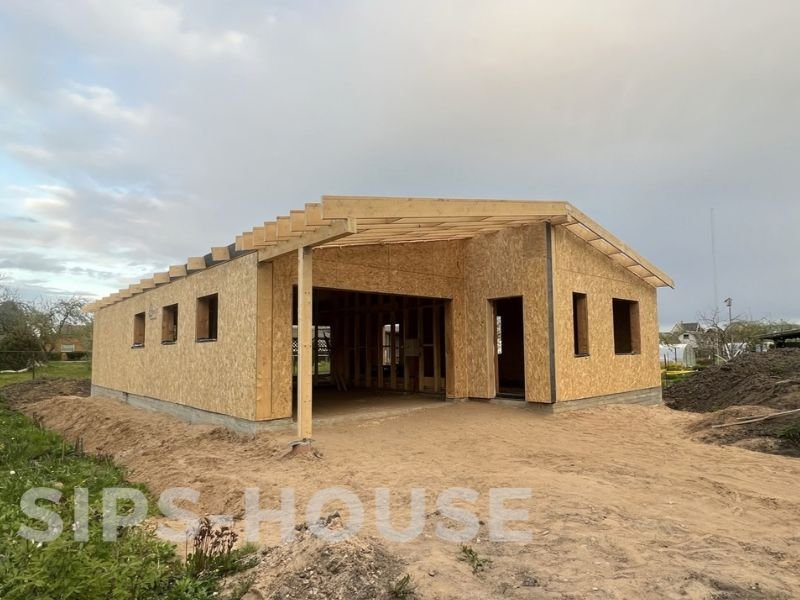Fully assembled SIP home kit showing the completed structural house shell sips homes