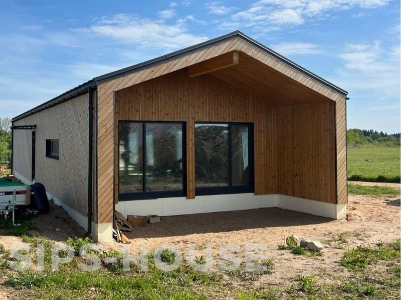 SIPS house exterior kit with cladding, windows and doors installed